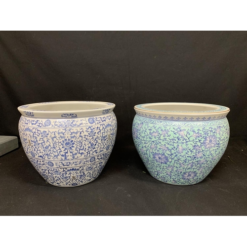 690 - 2 oriental fish bowls, decorated with Koi carp, tallest 30cms