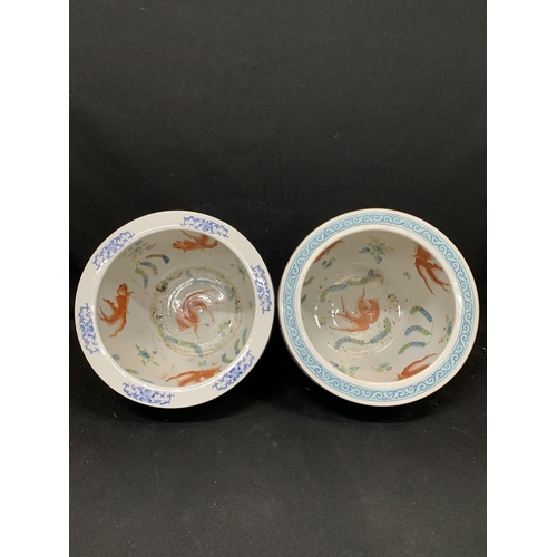 690 - 2 oriental fish bowls, decorated with Koi carp, tallest 30cms