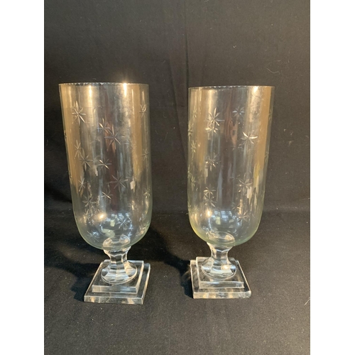 699 - Pair hurricane lamps, height 40cms