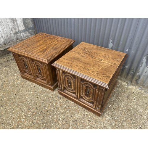 7 - A pair of oak two door side cupboards