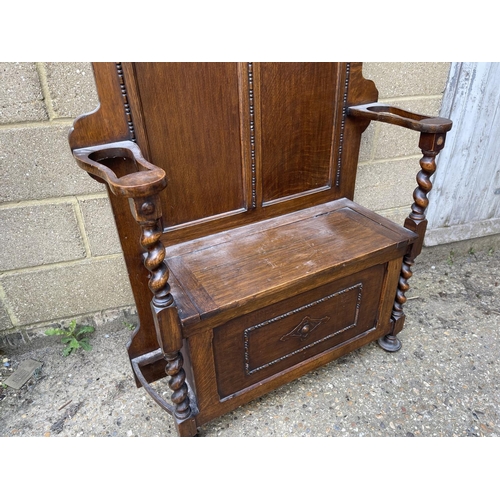 71 - An early 20th century oak hallstand