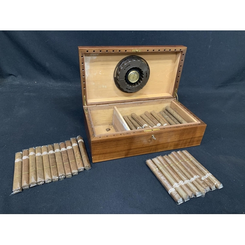 918 - A Humidor with Key 36 x 20 x 12 cms with 40 sealed cigars plus others