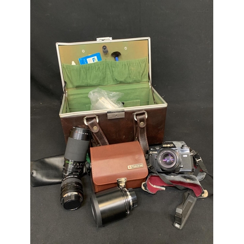 919 - Minolta X-700 Camera, three lenses and camera case