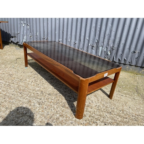 93 - A MYERS teak coffee table with smoked glass top