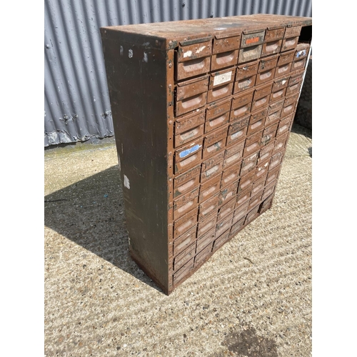 95 - A vintage metal bank of 60 drawers (one missing ) 90x30x106