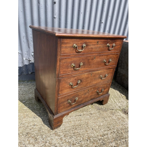 97 - A georgian mahogany commmode later converted to drinks cabinet