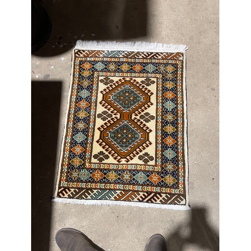 143 - AN oriental rug70x90