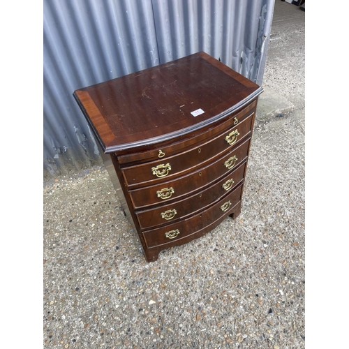 11 - A mahogany four drawer batchelors Chest with brushing Slide