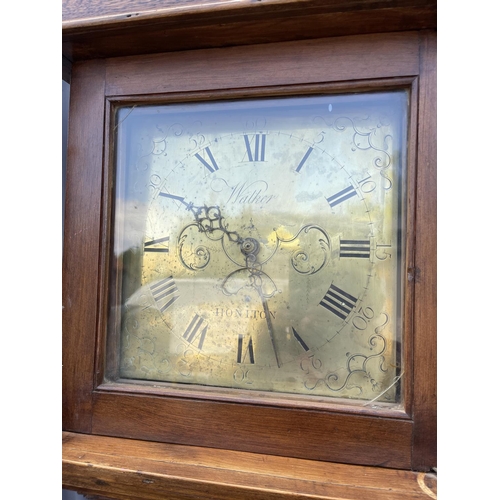 16 - An oak cased country long case clock with brass dial by WALKER OF HONITON