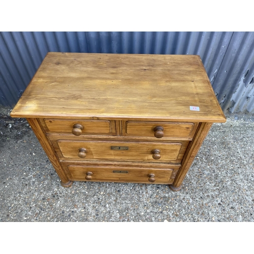 23 - A solid pine chest of four drawers 88x50x77