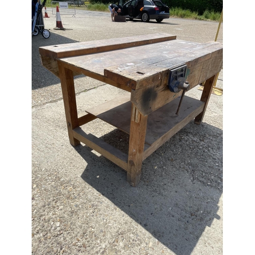 35 - A large carpenters workbench with record vice 144x77