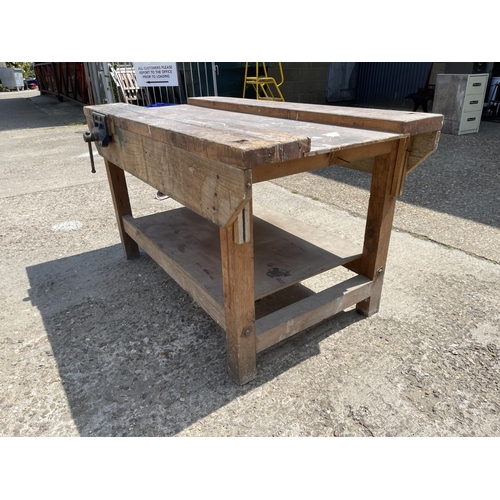 35 - A large carpenters workbench with record vice 144x77