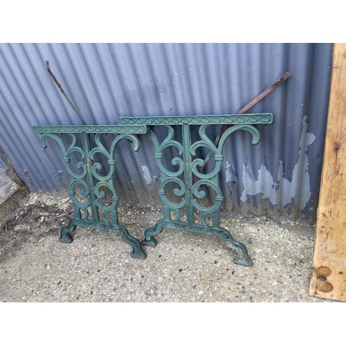 51 - A pair of green metal table legs together with pine plank table top 180 long