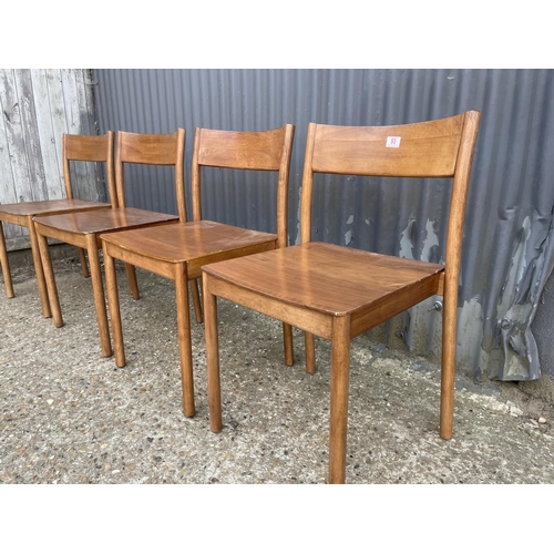 53 - A set of four mid century teak style stacking chairs