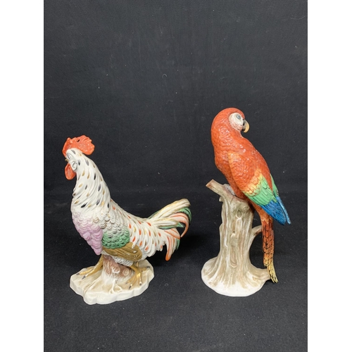 575 - Porcelain cockerel Figure with gold anchor mark and porcelain parrot Figure, height 29cms