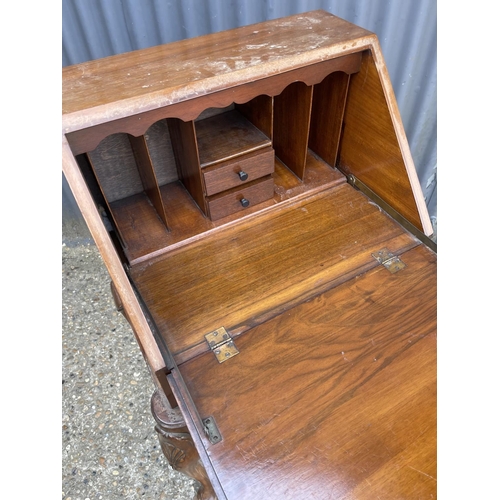 58 - A walnut single drawer bureau 57x42x 100