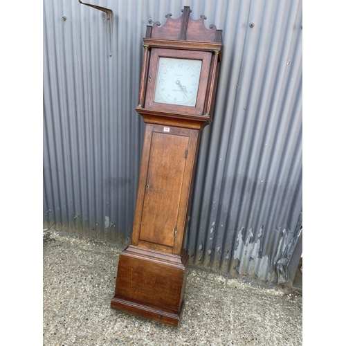 103 - An oak cased long-case clock by ELLIOT OF ASHFORD with two weights and pendulum