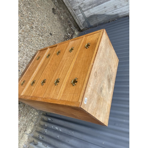 135 - A light oak chest of five 76 x 45 x111