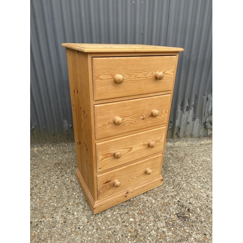 139 - A solid pine chest of four drawers 60x45x109