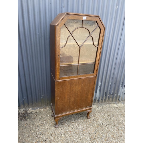 14 - An oak two door glazed cabinet 60x30x 160