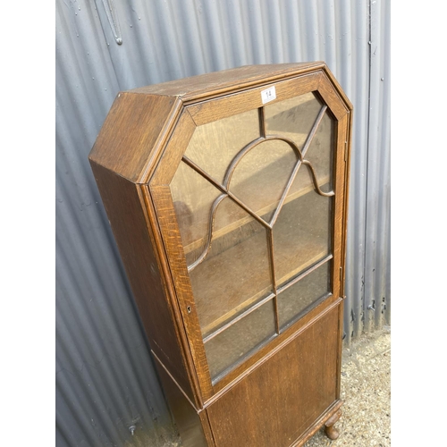 14 - An oak two door glazed cabinet 60x30x 160