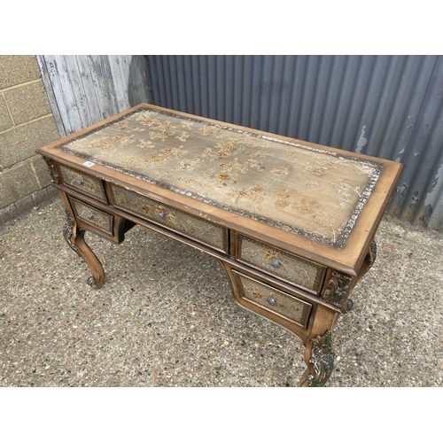 156 - An ornate painted five drawer writing table 120x60x80