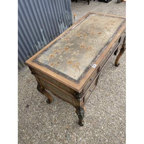 156 - An ornate painted five drawer writing table 120x60x80