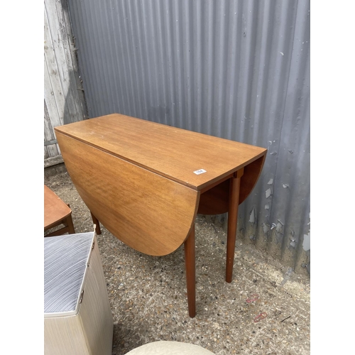 164 - A teak gate leg table, teak coffee table, stool and linen box