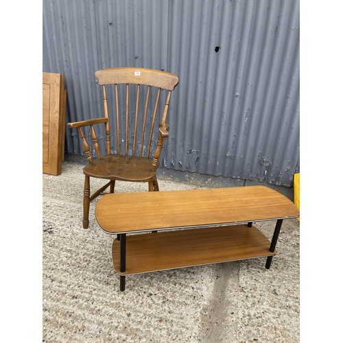 176 - A stick back carver chair together with a retro coffee table