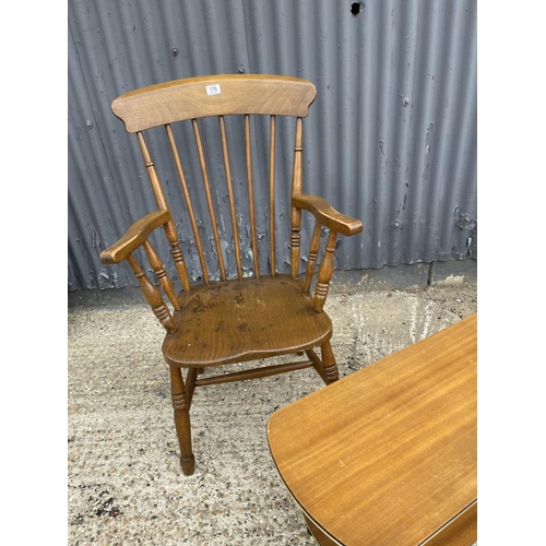 176 - A stick back carver chair together with a retro coffee table