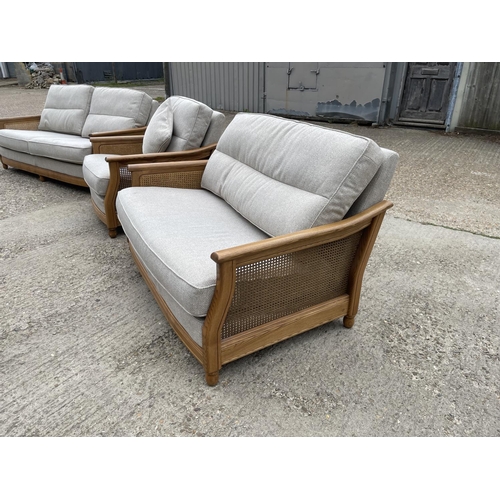 189 - An ercol golden dawn three piece lounge suite with begere frame and grey upholstery