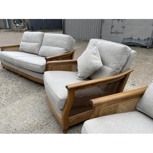 189 - An ercol golden dawn three piece lounge suite with begere frame and grey upholstery