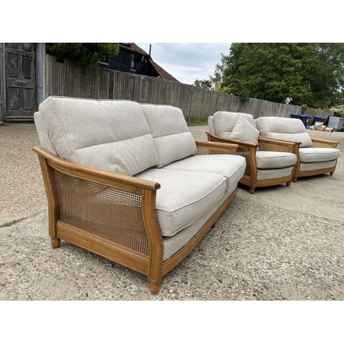 189 - An ercol golden dawn three piece lounge suite with begere frame and grey upholstery