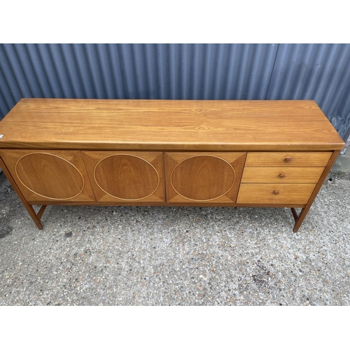 192 - A Nathan 'circles' teak sideboard 180x46x77