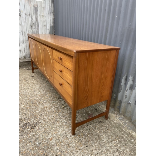 192 - A Nathan 'circles' teak sideboard 180x46x77