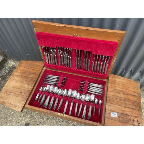 196 - An oriental hardwood canteen box with cutlery