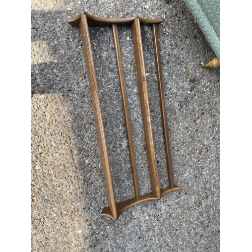 219 - An ercol plate rack, hall table and green bedroom chair