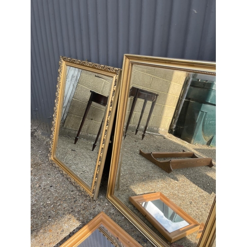 220 - Three large gold gilt framed mirrors and a pine mirror