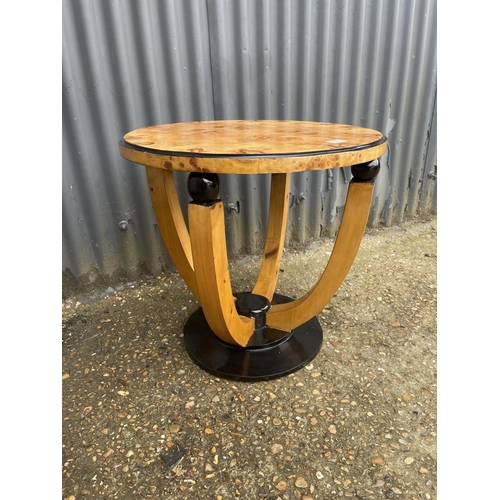 228 - An Art Deco birds eye maple circular occasional table 60cm diameter 55 cm high