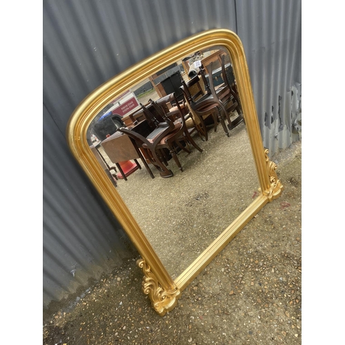 232 - A gold gilt overmantel mirror 120x120