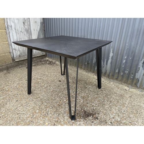 32 - A modern square dining table by Danetti 90x 93