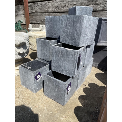 364 - A collection of 12 grey slate effect fibre clay square planters by APTA, each size 21 x 21 x 21 cms