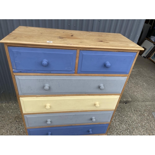 40 - A blue and yellow painted pine chest of drawers 106x44x140