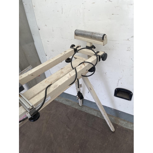 400c - Axminster slide chop saw on folding roller stand