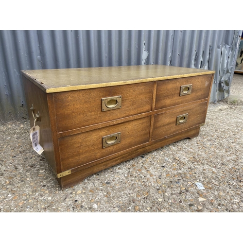 42 - A repro military style four drawer coffee table with green leather top 96x 42x 30