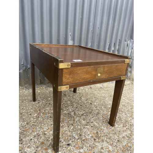 45 - A pair of military style mahogany lamp tables with brass handles