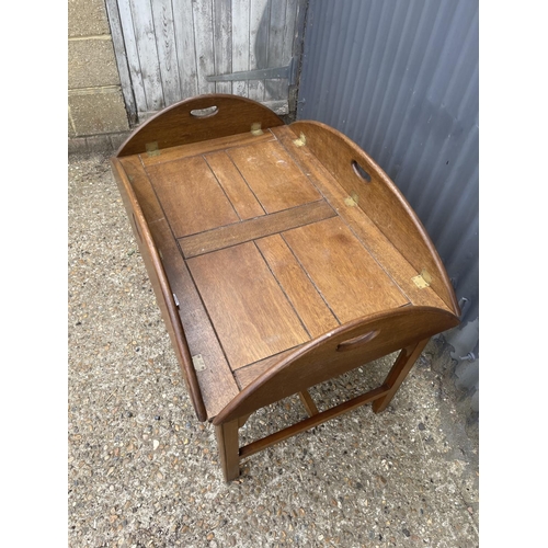 47 - A reproduction mahogany butlers tray top coffee table