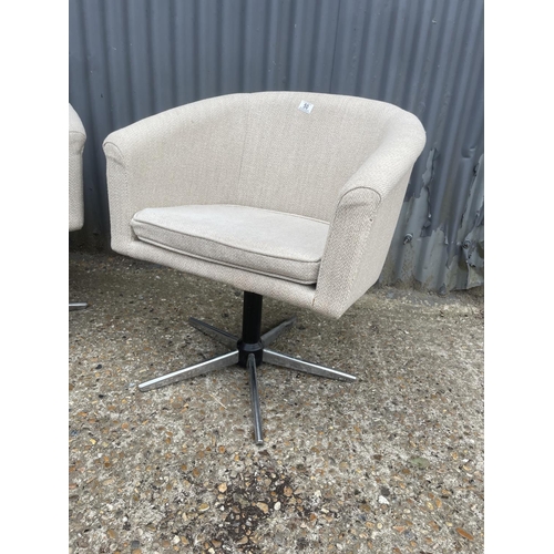 50 - A pair of retro design tub shape chairs with chrome star form base