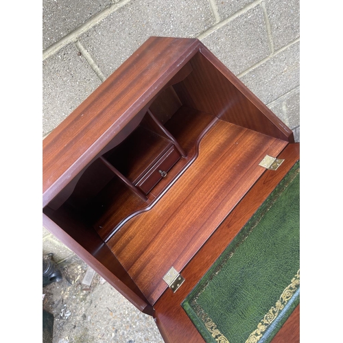 57 - A reproduction mahogany bureau