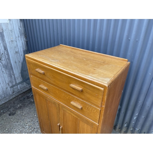 6 - A mid 20th century light oak tallboy gents wardrobe 84x46x 123